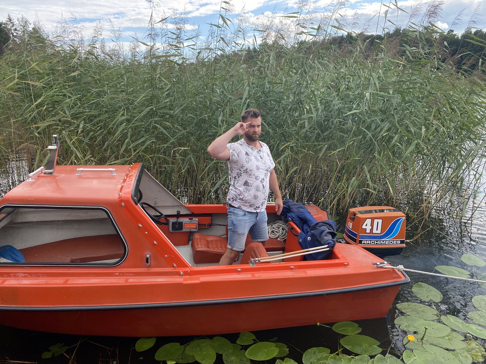 Martin captaining the orange Archimedes 40 in the reeds