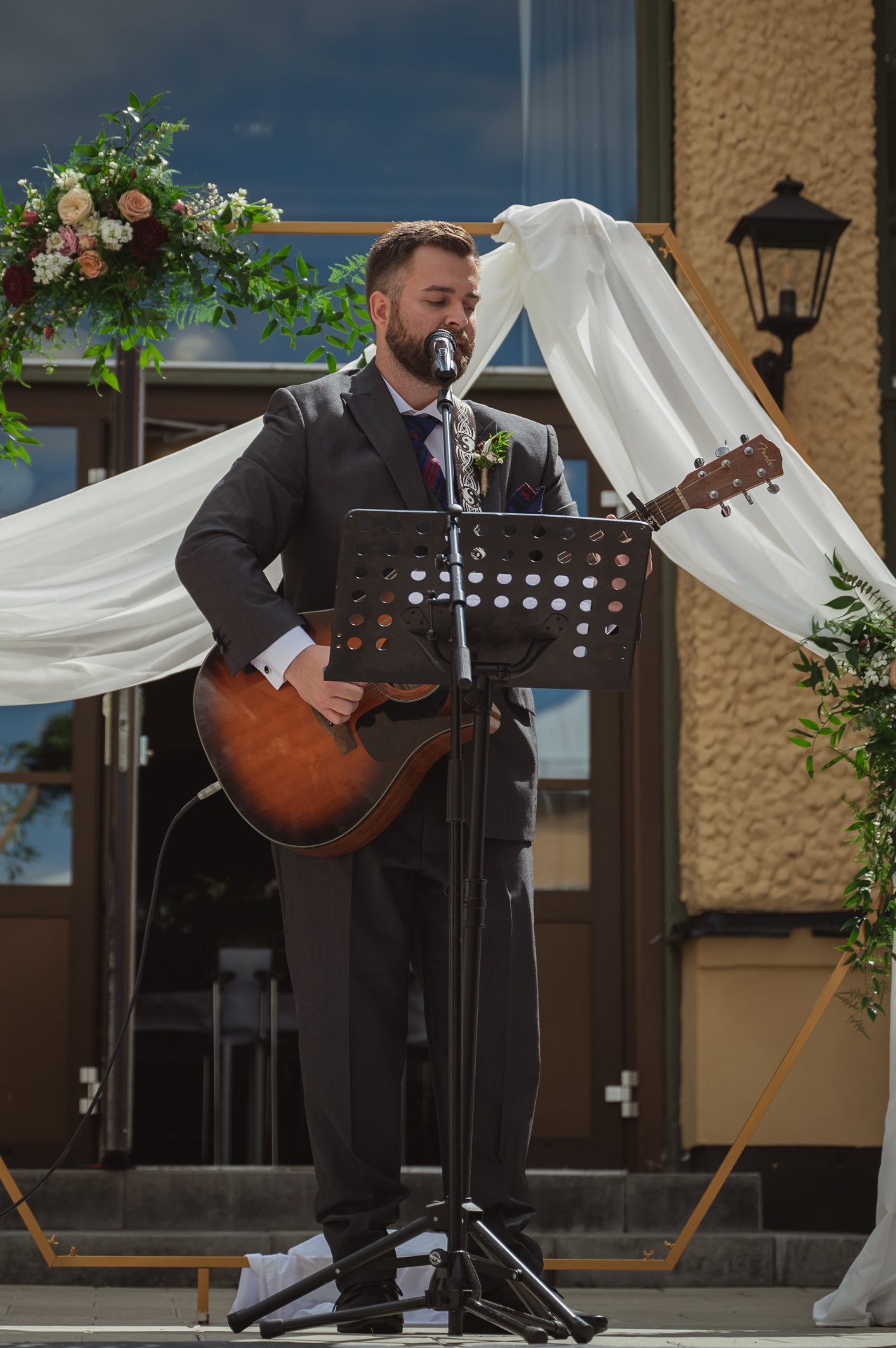 Martin singing Paper Rings with guitar at my wedding